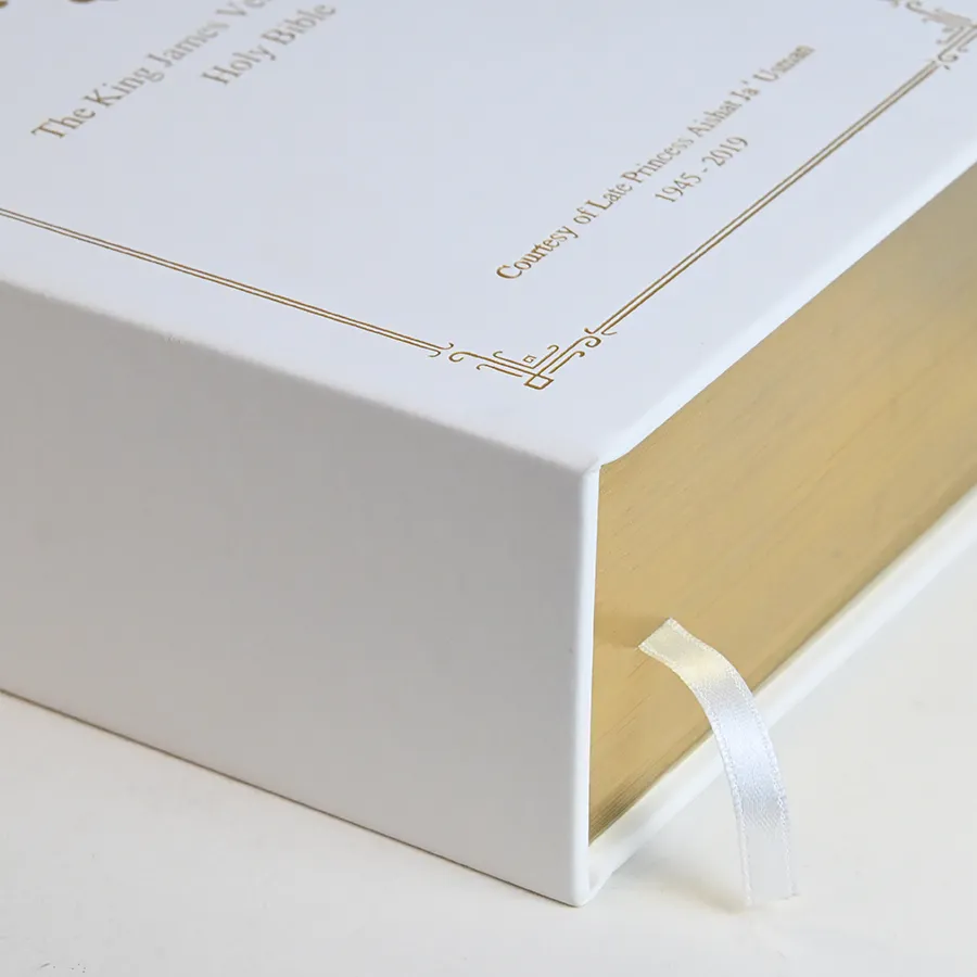 Finished gift edition with gilded edges and ribbon in presentation box